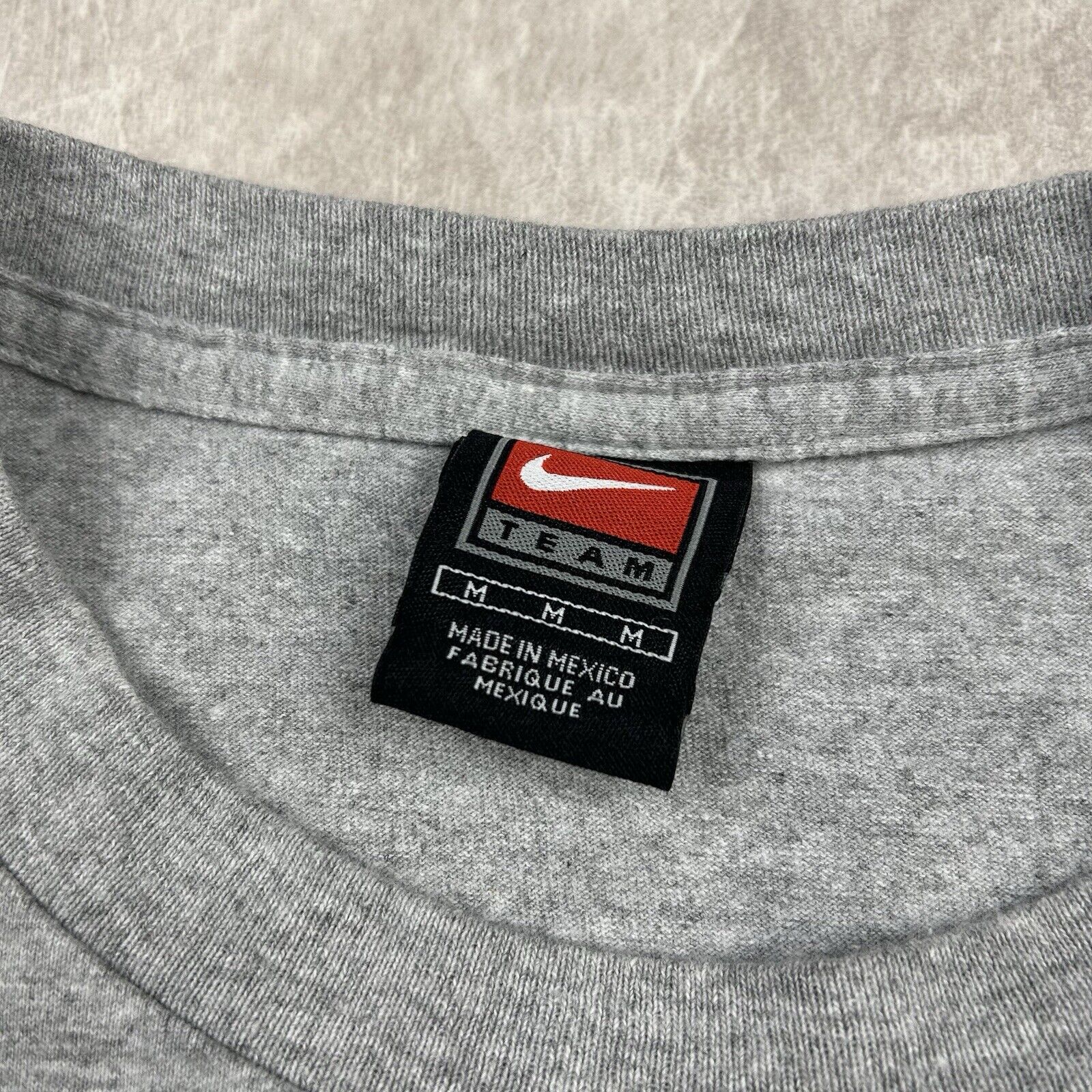 red nike tag
